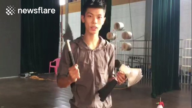 This man is an expert at throwing axes