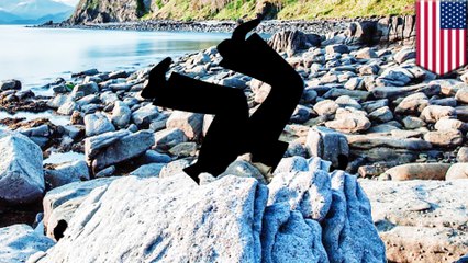 Man gets head stuck in rocks, freed with olive oil