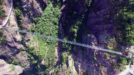Raw- Tourists Brave Glass-Bottom Bridge