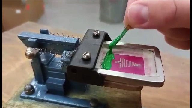 A Miniature T-Shirt Screen Printing Rig Designed by Devin Smith