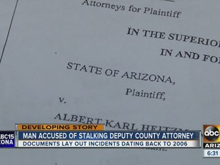 Man accused of stalking deputy county attorney
