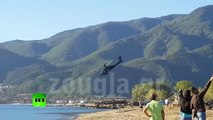 Dramatic Apache helicopter slams nose-down into sea during exercise in Greece