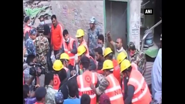 Indian rescuers pull out Nepalese woman alive from debris after 50 hours of earthquake