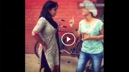 Villagers woman fight