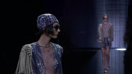 Armani revels in new freedom with catwalk charm offensive