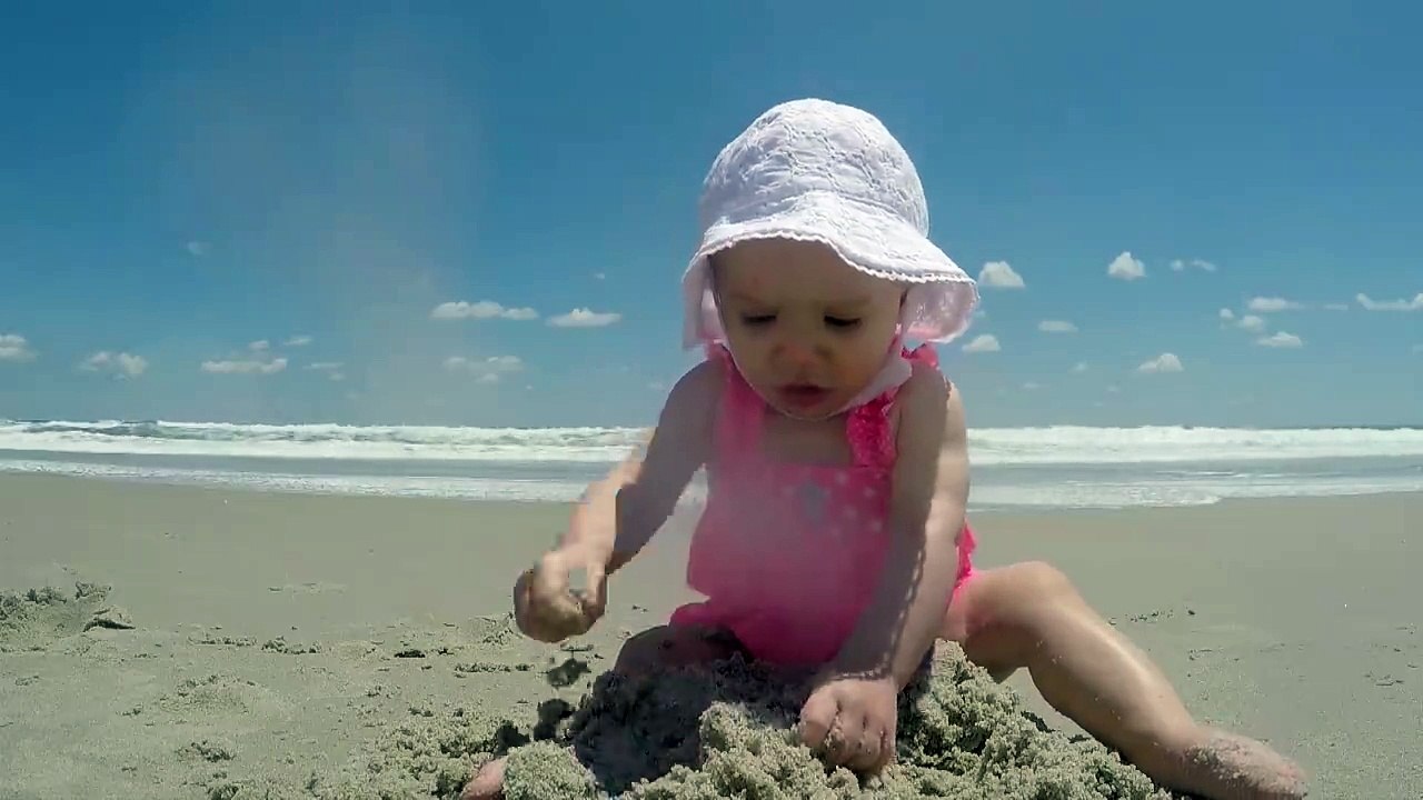 Cute Baby Gets A Beach Surprise