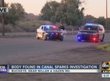 Police investigating a body found in a canal