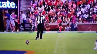 Woman takes football to face after failing to catch Auburn kickoff