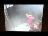 Women get  robbed in a elevator..Be careful.