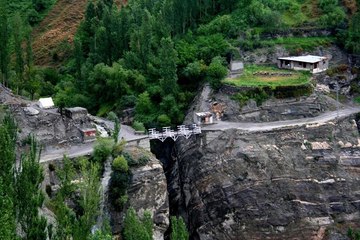 Boy Crosses Qu Qu Bridge