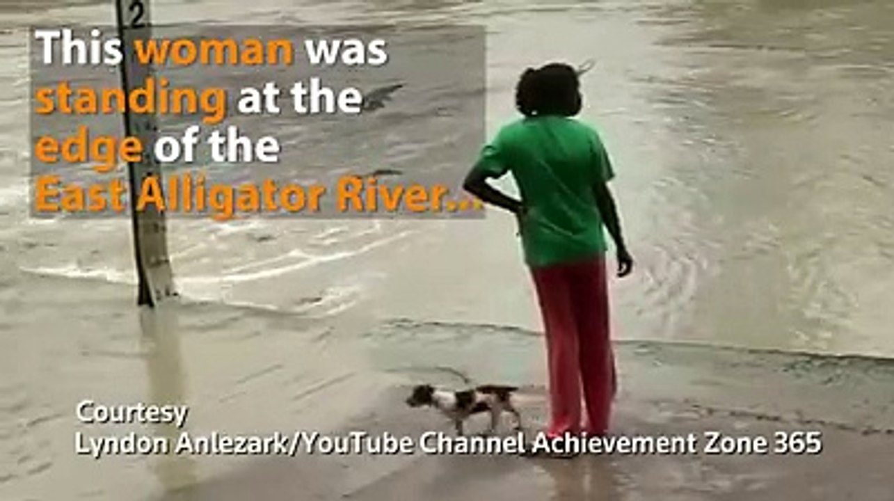 Woman shoos away a croc with just her flip-flops