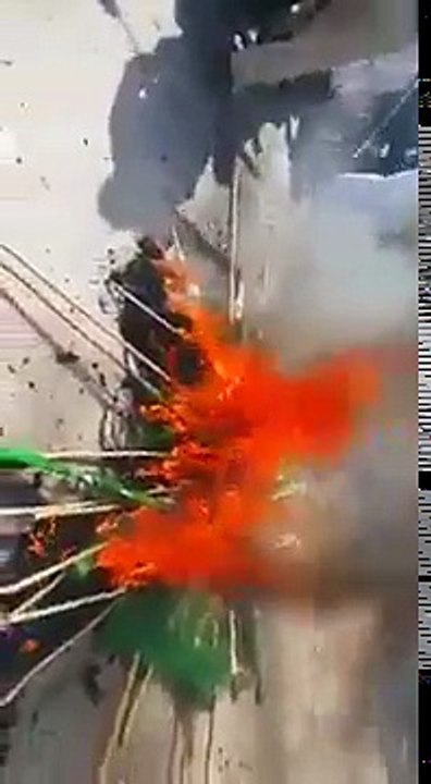 PMLN workers protests in Kohat People of PMLN burning flags and chanting Go Nawaz Go.