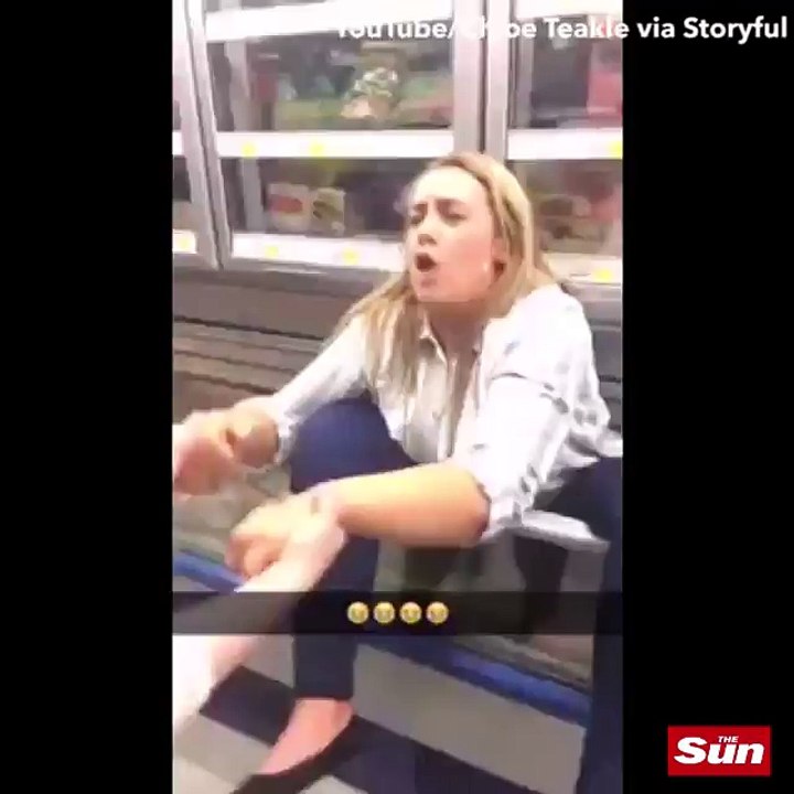 STUCK ON ICE Woman somehow gets stuck in a freezer as her friends try to pull her free