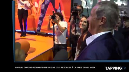 Nicolas Dupont-Aignan tente un DAB et se ridiculise à la Paris Games Week