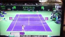 Kristen Flipkens hits the passing-shot