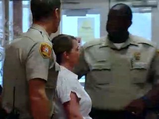 Tulsa officer Betty Shelby enters, leave courthouse for arraignment in Terence Crutcher case