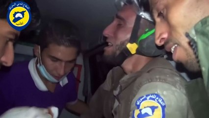 Rescue worker breaks down after saving baby girl in Syria