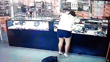 Fat woman in shorts falling down robbing a jewelry store