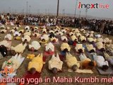 Foreign devotees practicing yoga at Maha Kumbh