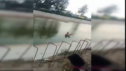 People rush to rescue and revive drowning boys