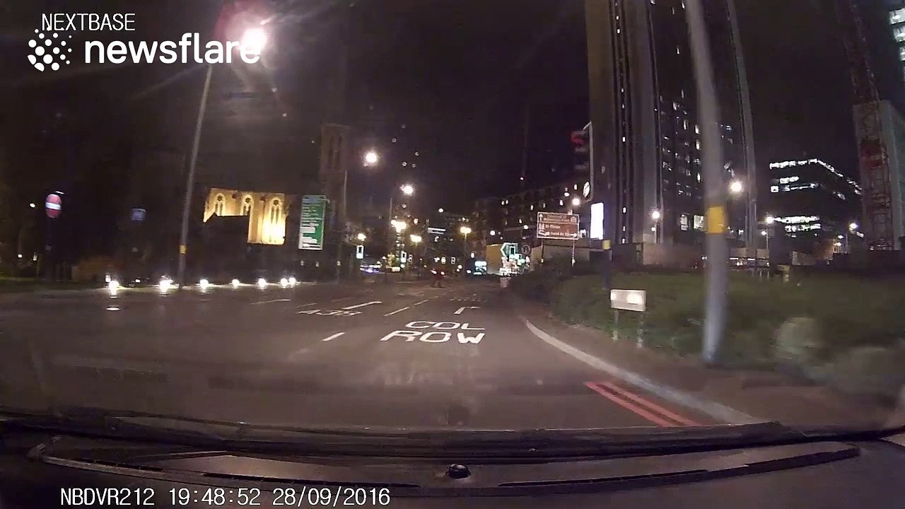 Cyclist narrowly escapes being hit by car after pulling out in front of it