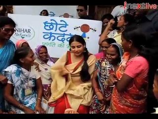 Vidya Balan charms little children