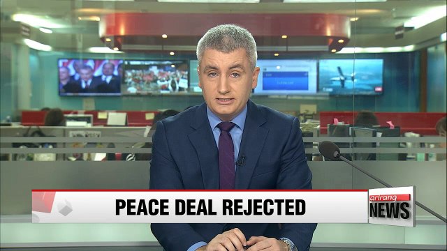 Colombians narrowly vote against peace deal with FARC rebels