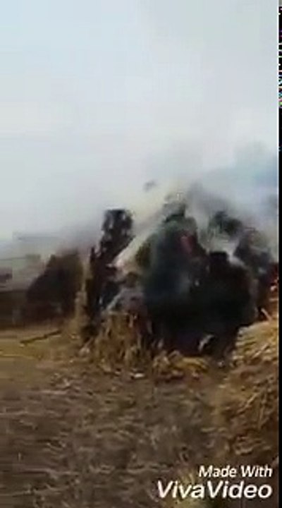 Indian Army burning crops and firing teargas shells at villagers in Kashmir