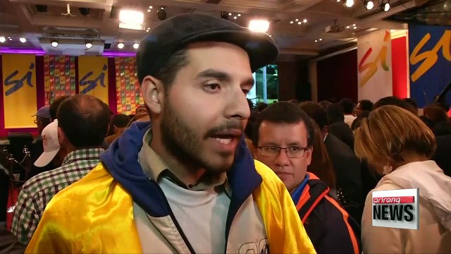 Colombians narrowly vote against peace deal with FARC rebels