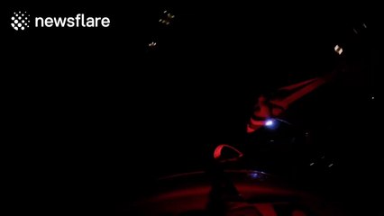 Paratrooper skydives at night