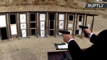 رئيس الاتحاد الروسي للرماية يعزف موسيقى بيتهوفن باستخدام مسدسين