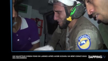Un sauveteur syrien fond en larmes après avoir secouru un bébé coincé sous des décombres