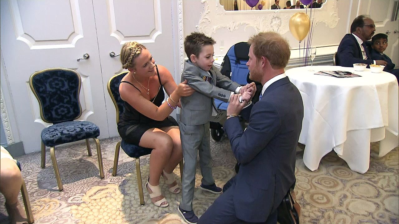 Chronically ill boy hugs Prince Harry at WellCh...
