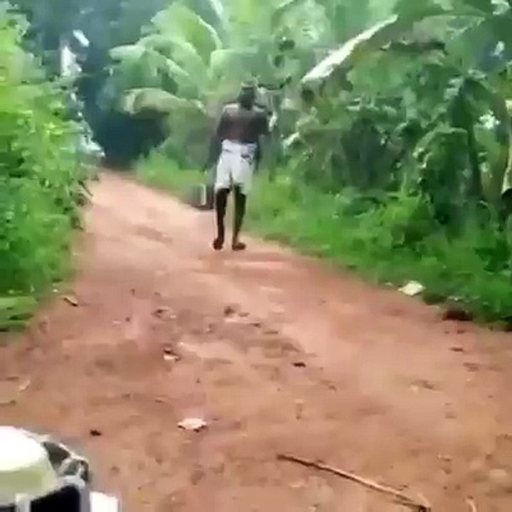 A man was walking on his way and suddenly a snake jumped over him