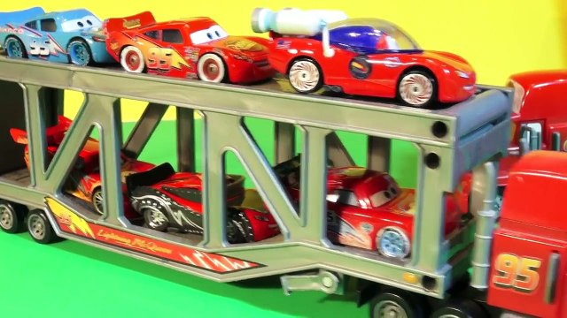 Disney Pixar Cars with Mack Transporter and Mack from Car 1 with Lightning McQueen, and Mater