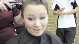 Blonde girl shaves her head bald for Worlds Greatest Shave