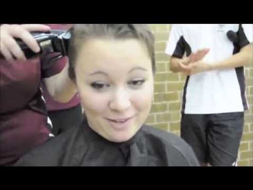 Blonde girl shaves her head bald for Worlds Greatest Shave