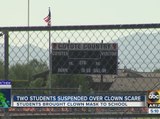 Two students being disciplined for bringing clown masks to school