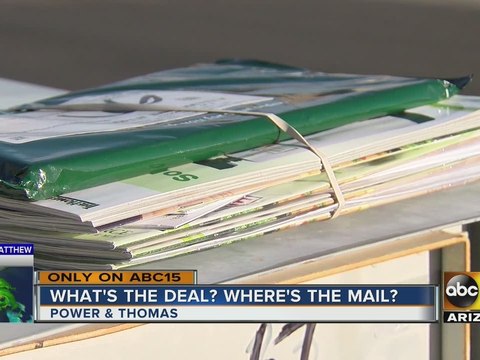 Neighbors trying to figure out why mail was left on top of Mesa mailboxes