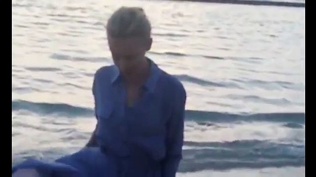 Danni films sister Kylie Minogue in flowing dress