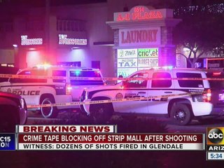 Crime tape blocking off strip mall after Glendale shooting