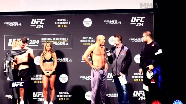 Michael Bisping and Dan Henderson face off for fans at the UFC 204 ceremonial weigh-ins