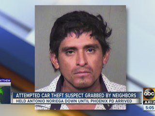 Attempted car theft suspect grabbed by neighbors