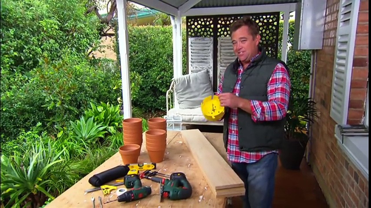 Besoin d'un peu d'intimité sur votre patio - Ce qu'il a fait avec des pots en terre cuite est épatant!