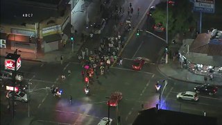 Protesters take to the streets of South Los Angeles after two fatal officer-involved shootings over the weekend