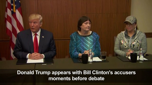 Trump appears with Bill Clinton's accusers, moments before debat