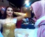 Saudi guy throws a lot of money over Iraqi belly dancer!