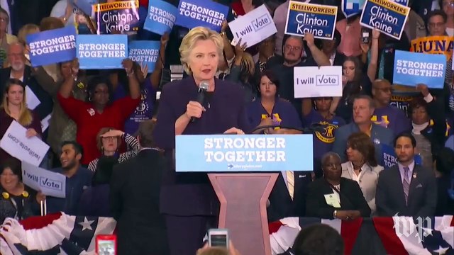 Protester wearing 'rape' shirt interrupts Clinton rally