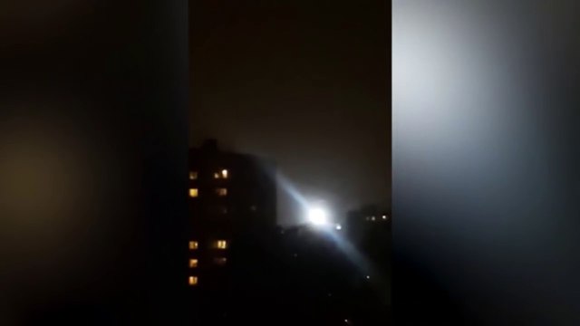 Raw- 'UFO' shaped ball of light caught on camera hovering over Moscow