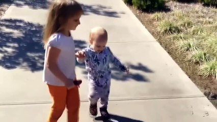 cute baby wonder about their own shadow